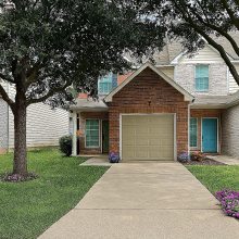 Front of townhome and has been digitally enhanced