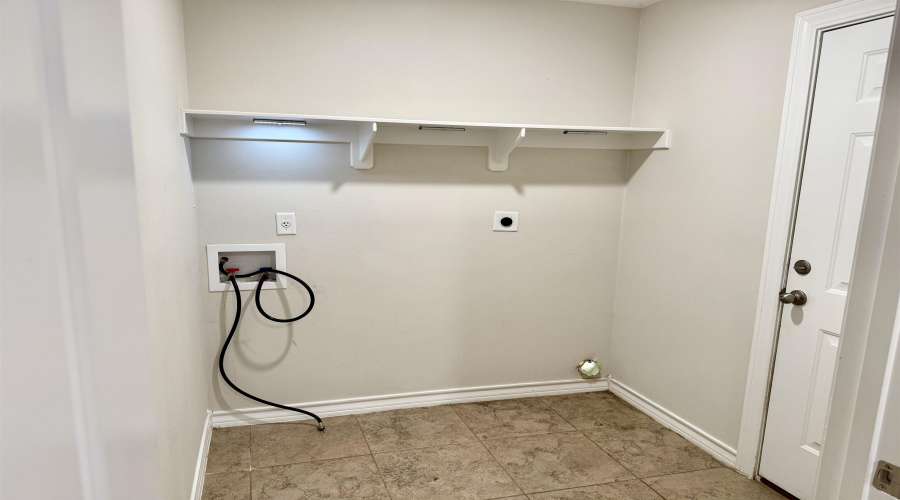 Laundry Room connects to the Garage and a Storage Room