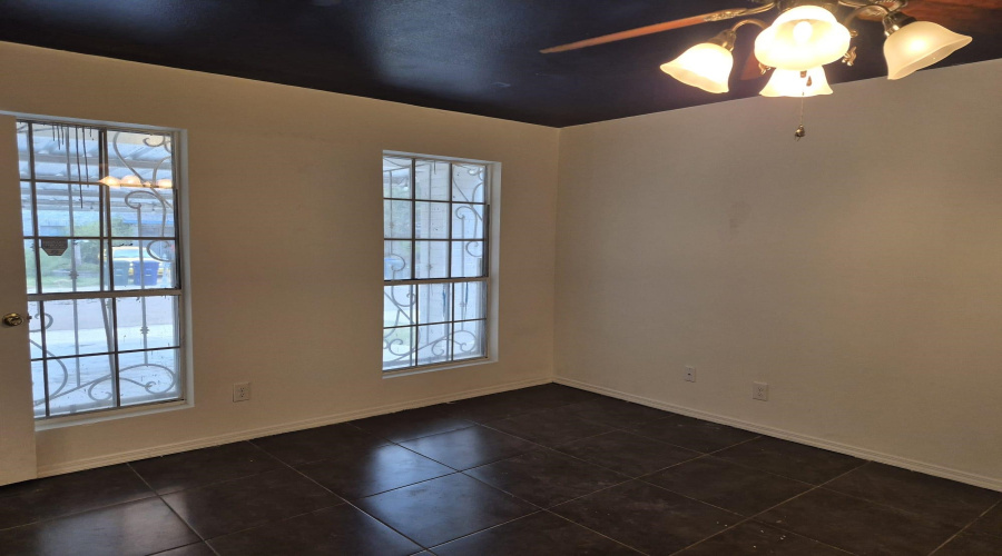 DOWNSTAIRS BEDROOM, WINDOWS FACE FRONT OF THE HOUSE