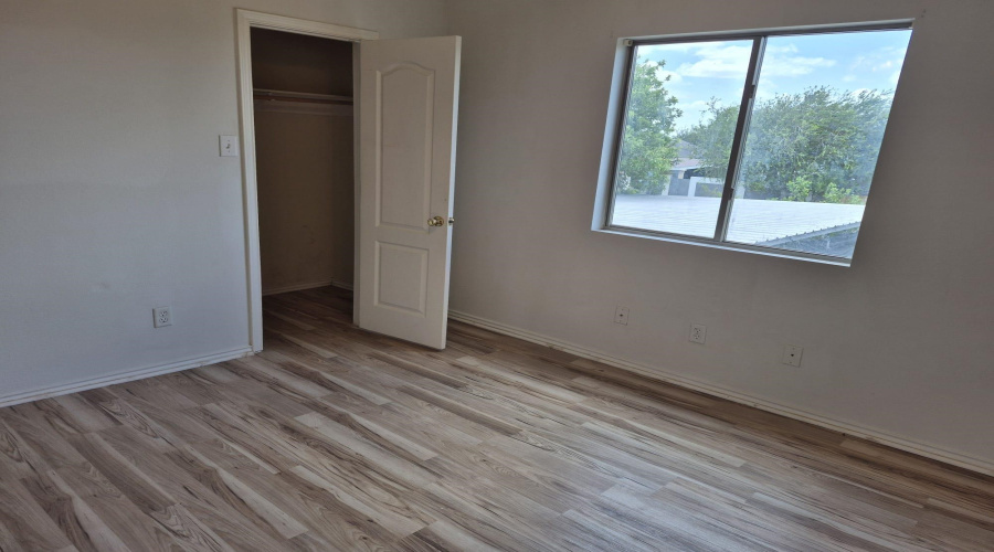 UPSTAIRS BEDROOM, WINDOWS FACE BACK OF THE HOUSE