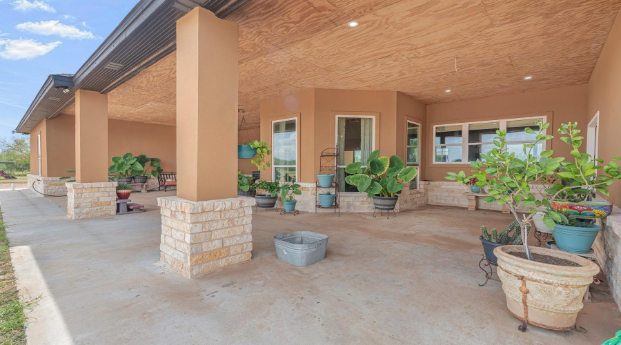 Back Porch with area off the Primary Suite or Living Room with full shade in the evenings.